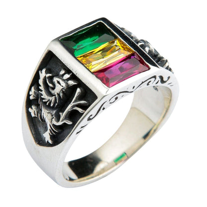 An angled perspective of the handcrafted Lion of Judah ring, showcasing the polished silver and detailed side carvings.