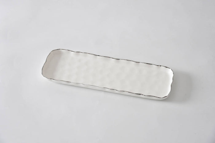 Silver rectangular tray on a light gray background