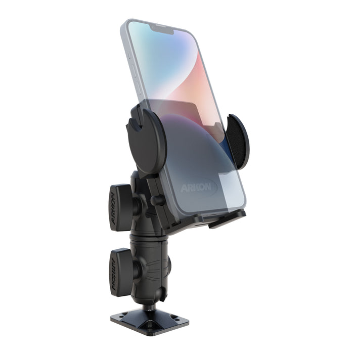 The Mega Grip™ Phone Drill Base Mount with Double Socket Swivel Arm holds a smartphone vertically in its black adjustable frame. Featuring a mega grip phone holder with secure side clamps and multiple tightening knobs for precise positioning, this mount includes a sturdy rectangular base for secure attachment—making it an ideal choice for those seeking a reliable phone drill base mount.