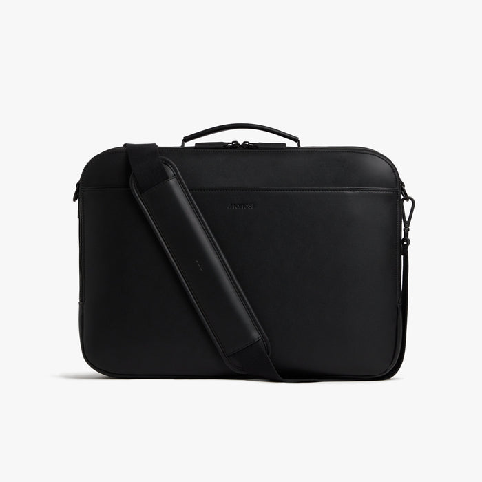 Carbon Black (Vegan Leather) | Front view of Metro Briefcase in Carbon Black with shoulder strap in front