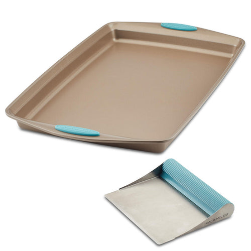 Nonstick baking sheet and bench scrape set featuring blue silicone grips.