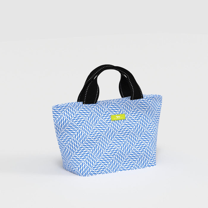 Blue patterned tote bag with a black handle on a light gray background