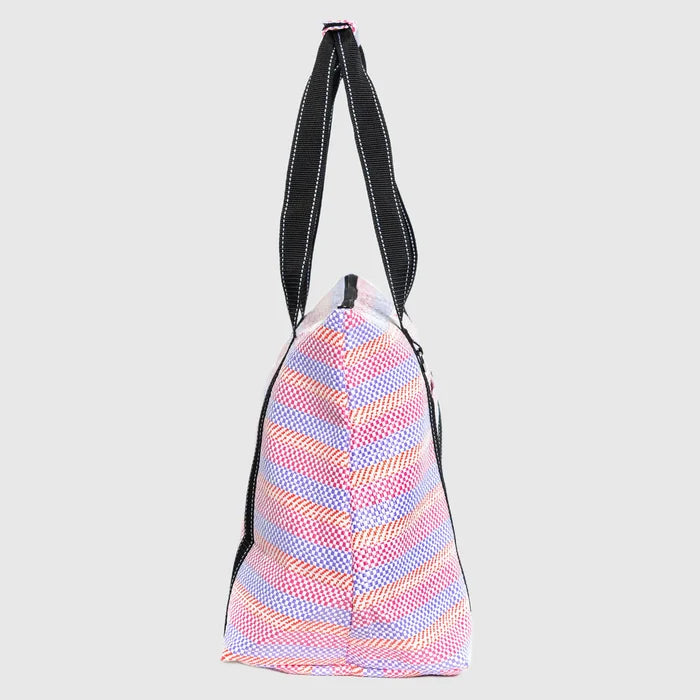 Drawstring bag with a colorful pattern on a light gray background