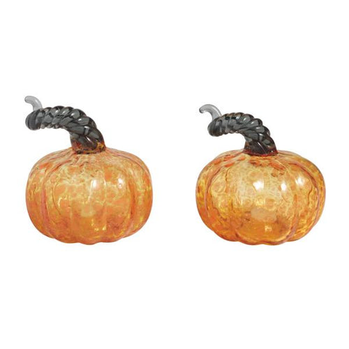 Two decorative glass pumpkins in a warm orange color with a textured, crackled finish and dark braided stems, shown side by side on a white background.