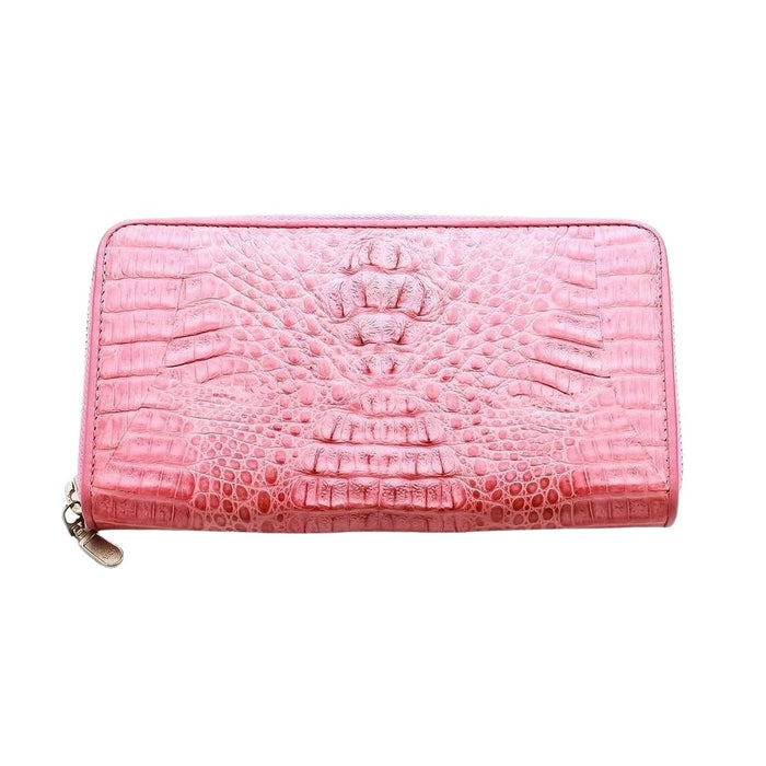 A women's pink crocodile leather wallet with a zip-around closure and genuine hornback skin.