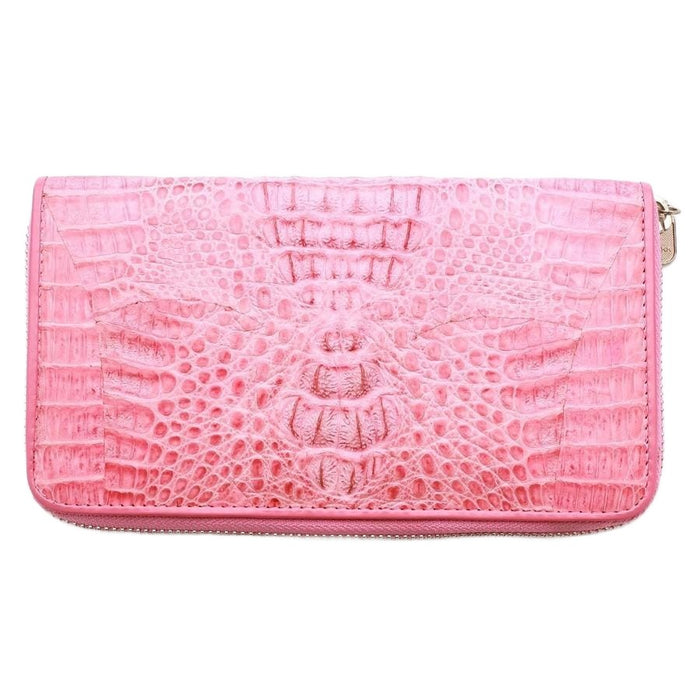 A luxury pink crocodile wallet showing the distinct hornback scales, on a white background.