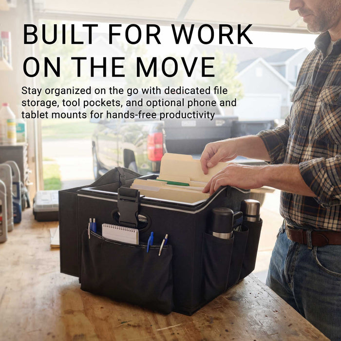 A person organizes folders and tools in the Portable Crate Workstation with Apron Organizer – Choose Your Mounting Setup, displayed on a table in a garage. The efficient mobile workstation highlights flexible device mounting options and features text promoting enhanced productivity for work on the go.