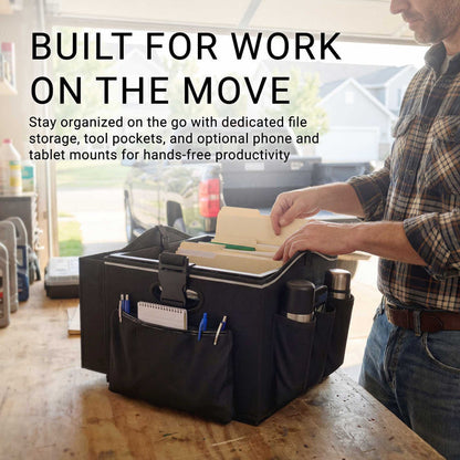 A person organizes folders and tools in the Portable Crate Workstation with Apron Organizer – Choose Your Mounting Setup, displayed on a table in a garage. The efficient mobile workstation highlights flexible device mounting options and features text promoting enhanced productivity for work on the go.