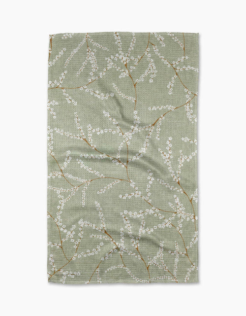 Fabric with floral pattern on a green background