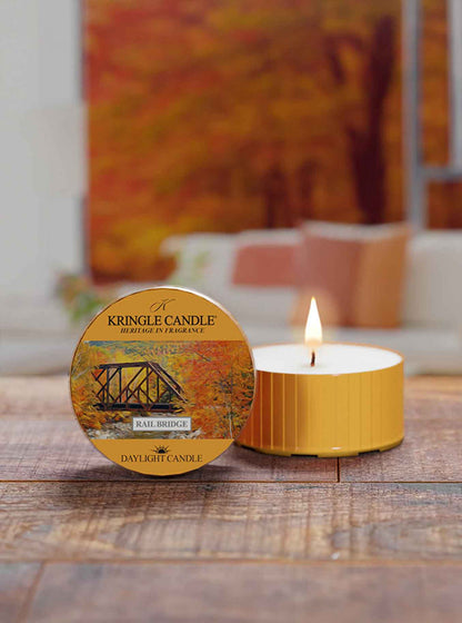 Kringle Candle daylight candle with packaging on a wooden surface