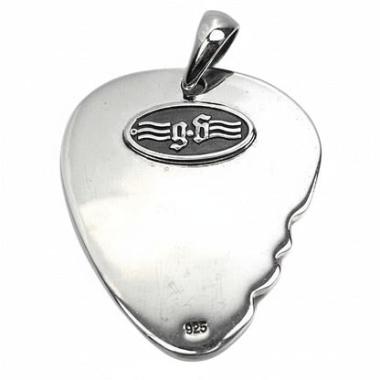 The back of the silver guitar pick pendant, showing the .925 hallmark stamp.
