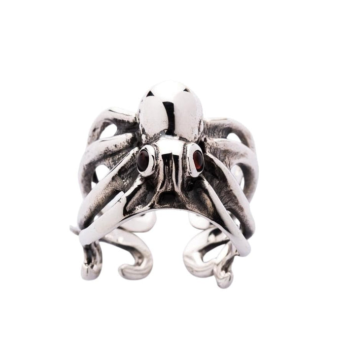 Gothic style sterling silver octopus ring front face with dual red garnet eyes