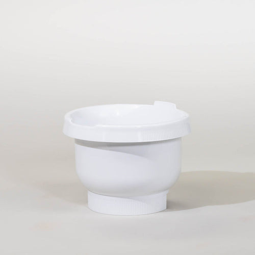 Bosch compact mixer white plastic bowl with lid on a grey background