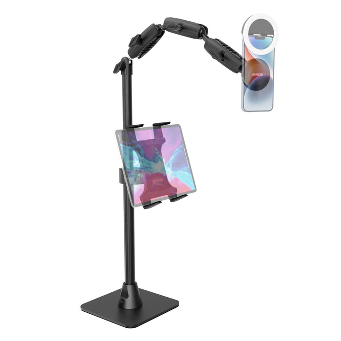 Meet the Remarkable Creator™ Pro+Plus Mount with MagSafe Compatible Holder: an adjustable black stand featuring secure clamps that hold your tablet in the center and a smartphone at the top—both displaying vibrant screens—against a white background. It’s the ultimate versatile mount for content creators.