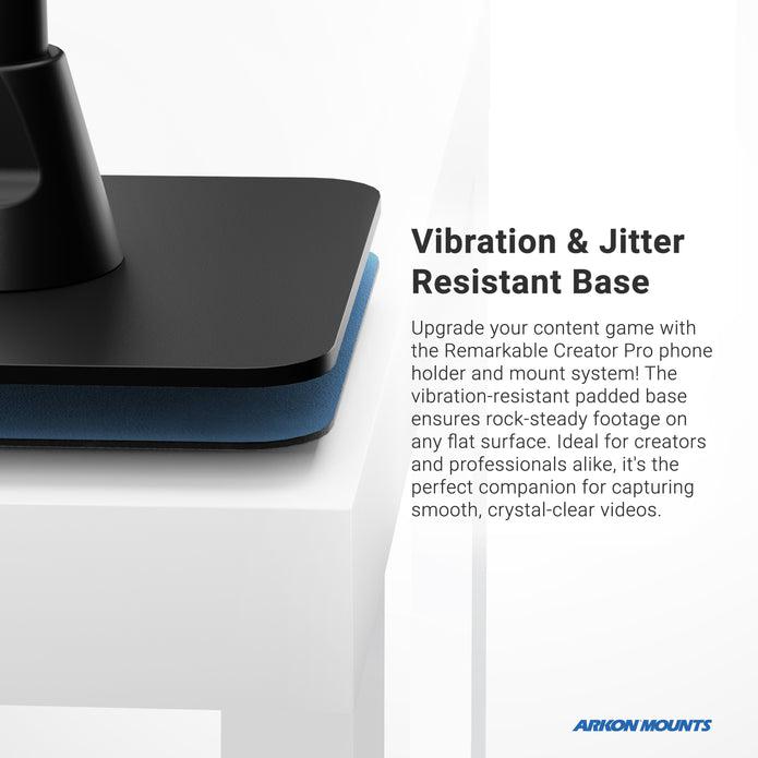 Close-up of the black, rectangular Remarkable Creator™ Pro Mounts vibration-resistant base on a white surface, with text emphasizing its stability for creators and content makers. Arkon Mounts logo appears in the bottom right corner.