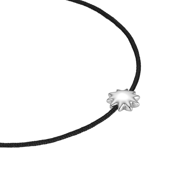 Schwarzes Textilarmband mit Sonnen-Anhänger