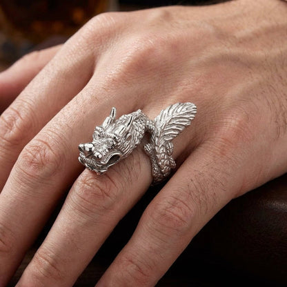 Sterling silver dragon ring worn on hand demonstrating size and dramatic visual presence