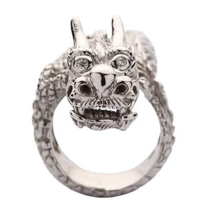 Front view of sterling silver dragon ring featuring prominent horns and intricate whisker details