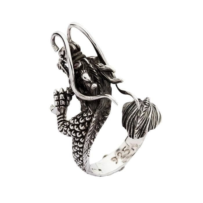 Full view of handcrafted silver dragon ring displaying intricate body scales claws and whiskers