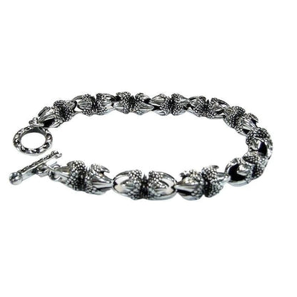 Sterling silver eagle claw link bracelet with T-bar clasp full view on white background