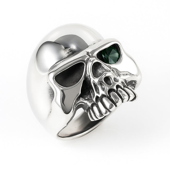 The gothic half-skull ring with a single green eye.