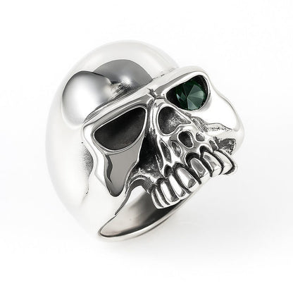 The gothic half-skull ring with a single green eye.