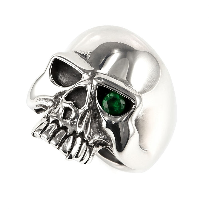 A close-up of the biker skull ring, detailing the green emerald CZ stone.