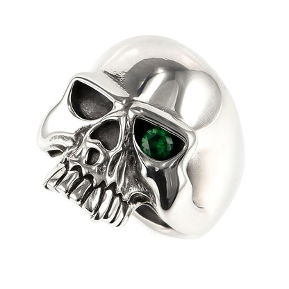 A close-up of the biker skull ring, detailing the green emerald CZ stone.
