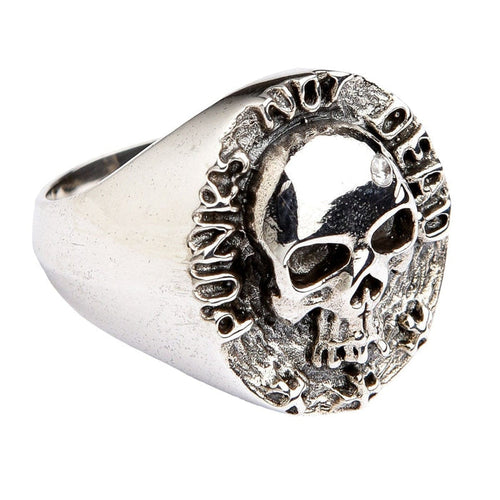 A solid sterling silver 'Punk Not Dead' skull ring with a brilliantly polished skull and a sparkling diamond CZ accent.
