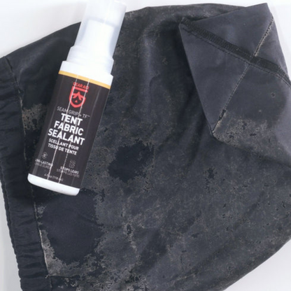 Restore your tent or coated fabrics in a snap with this easy Gear Aid Sealant.  This clear sealant makes tent waterproofing hassle-free with its built-in foam applicator brush. Over time, the protective waterproofing on a tent floor, rain fly, or tarp wears out and begins to flake off.  When a rainfly gets sticky or backpacks start delaminating, make them perform again with Seam Grip TF Tent Fabric Sealant.