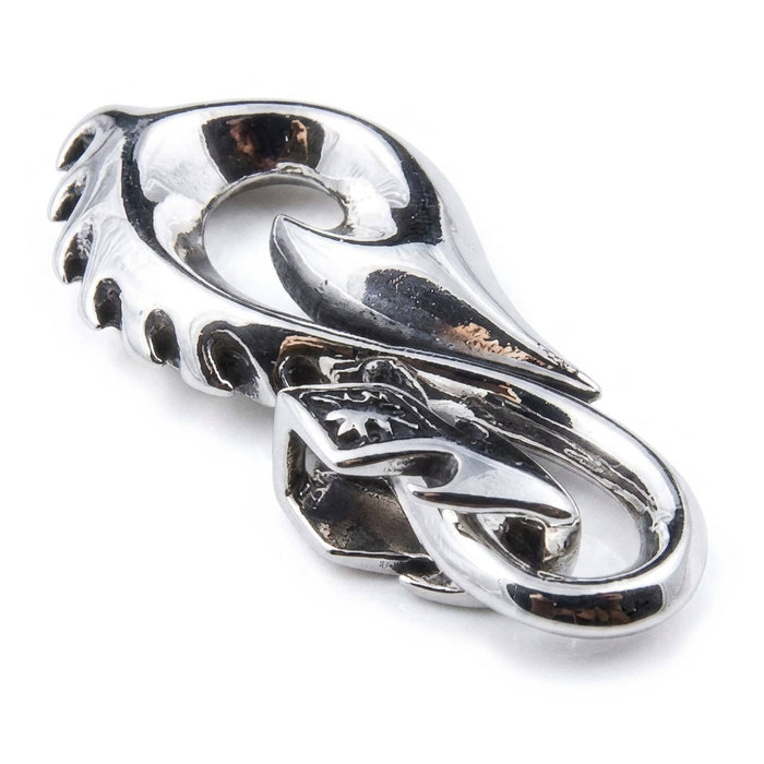 Carved spine grooves and serrated edges on a .925 sterling silver tribal fishhook pendant