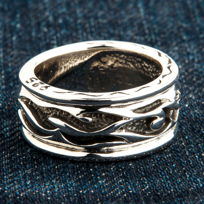 A side view of the solid 925 sterling silver tribal ring showing the .925 hallmark inside the band.
