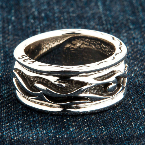 A side view of the solid 925 sterling silver tribal ring showing the .925 hallmark inside the band.