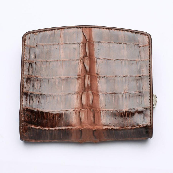 Back view of handcrafted exotic leather wallet highlighting natural texture