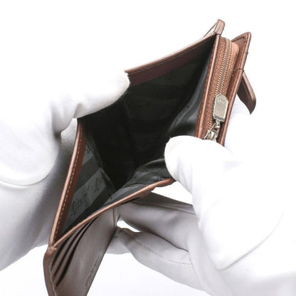 Close-up of the bill slot on the two-tone crocodile wallet