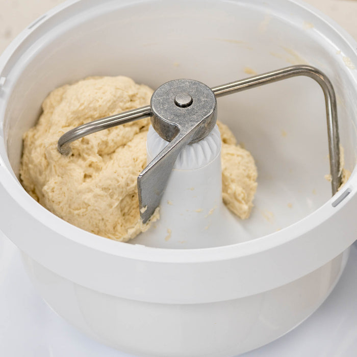 Bosch white universal plus mixer mixing dough