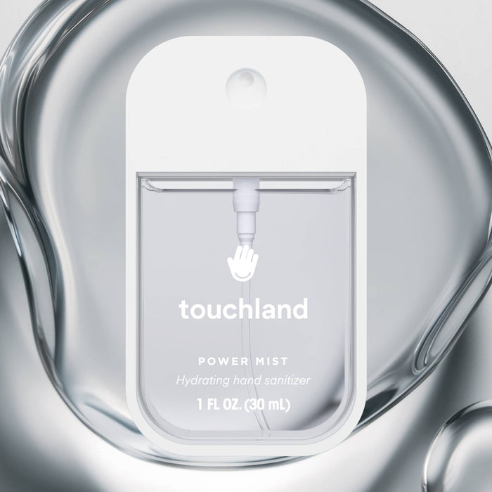 Touchland power mist hydrating hand sanitizer packaging on a reflective surface