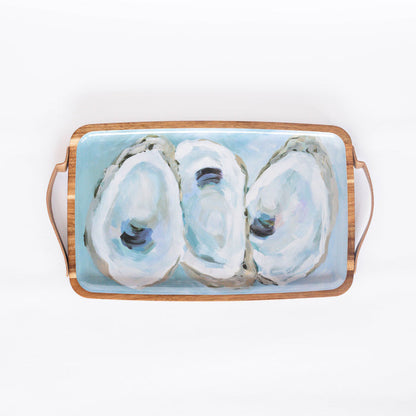 wooden tray with oyster pattern against white background