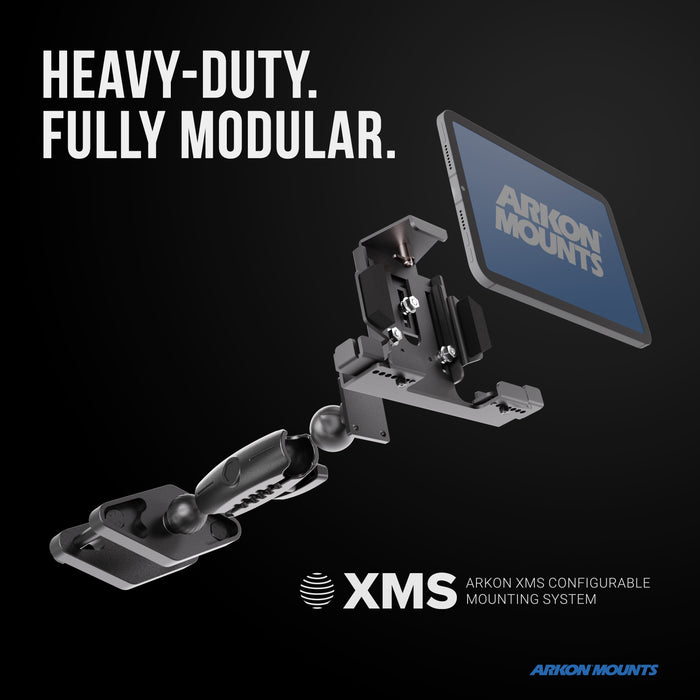 Exploded view of the XMS™ Heavy Duty Forklift Mount with LockVise™ Metal Locking Tablet Holder, displaying its modular components separated, with text HEAVY-DUTY. FULLY MODULAR. and XMS Arkon XMS Configurable Mounting System on a black background—a perfect illustration of an industrial tablet mounting system engineered for demanding environments such as forklift tablet mount applications.