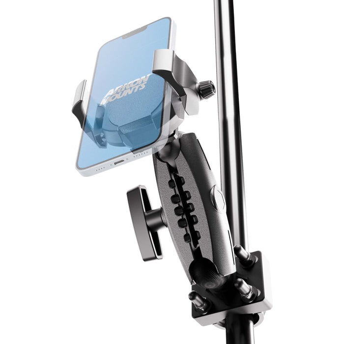 The XMS™ U-Bolt Mount with RoadVise® Ultra Phone Holder is shown securely gripping a smartphone and attached to a pole in this setup. The holder features adjustable arms and tightening knobs for enhanced stability. The phone screen displays blurred text, demonstrating the secure hold and versatility of this adjustable mounting solution.